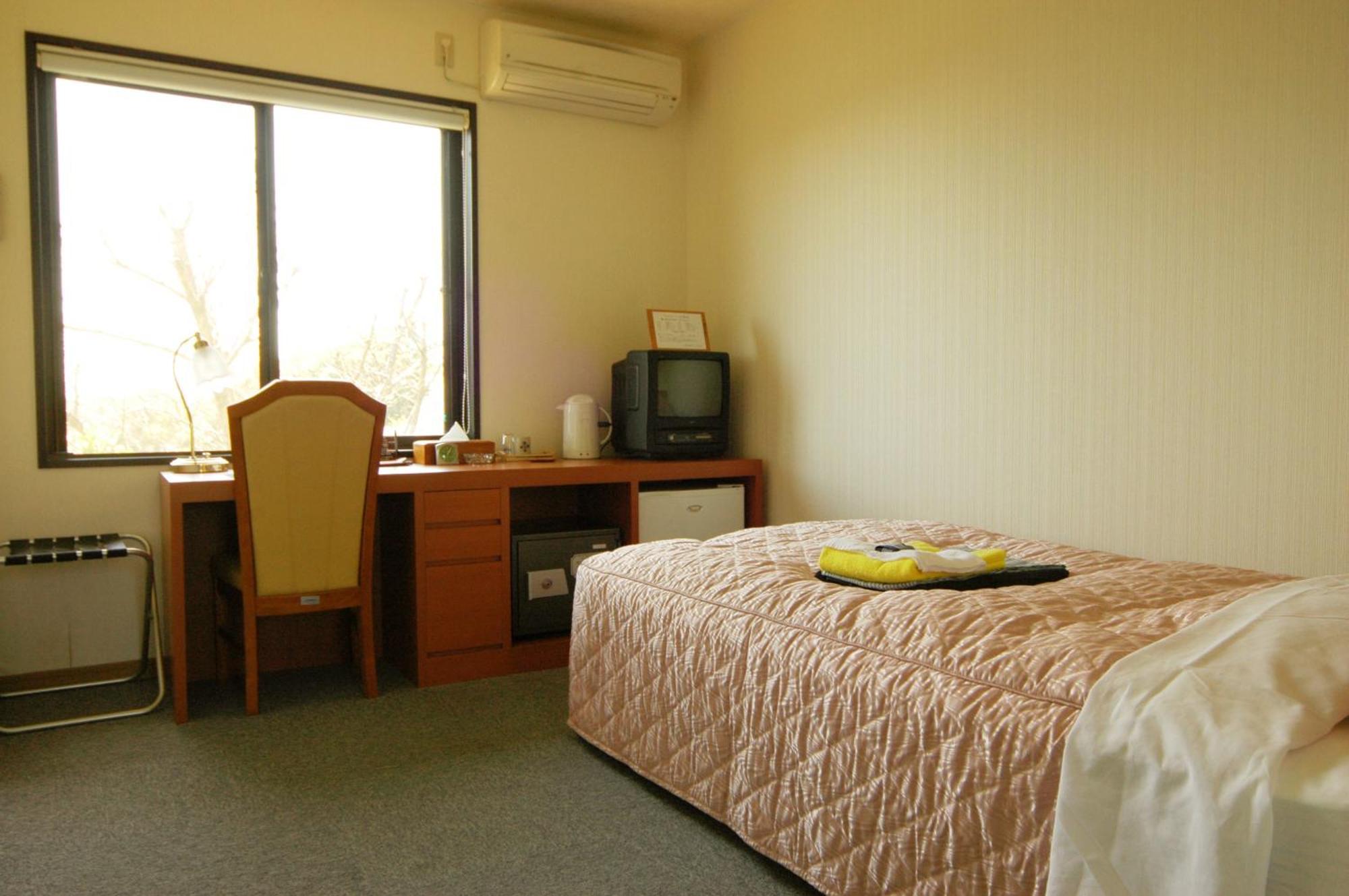 Yakushima Green Hotel Quarto foto